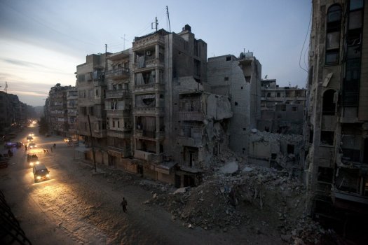 Business Insider's "The 20 Award-Winning Photos From The War In Syria Everyone Should See." Night falls on a Syrian rebel-controlled area of Aleppo, Nov. 29, 2012, as destroyed buildings, including Dar Al-Shifa hospital, are seen on Sa'ar street after airstrikes targeted the area a week before.  Source: AP Photo/Narciso Contreras.